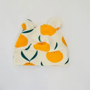 Eddie & Bee organic cotton Baby hat with ears  in Cream " Clementine" print.